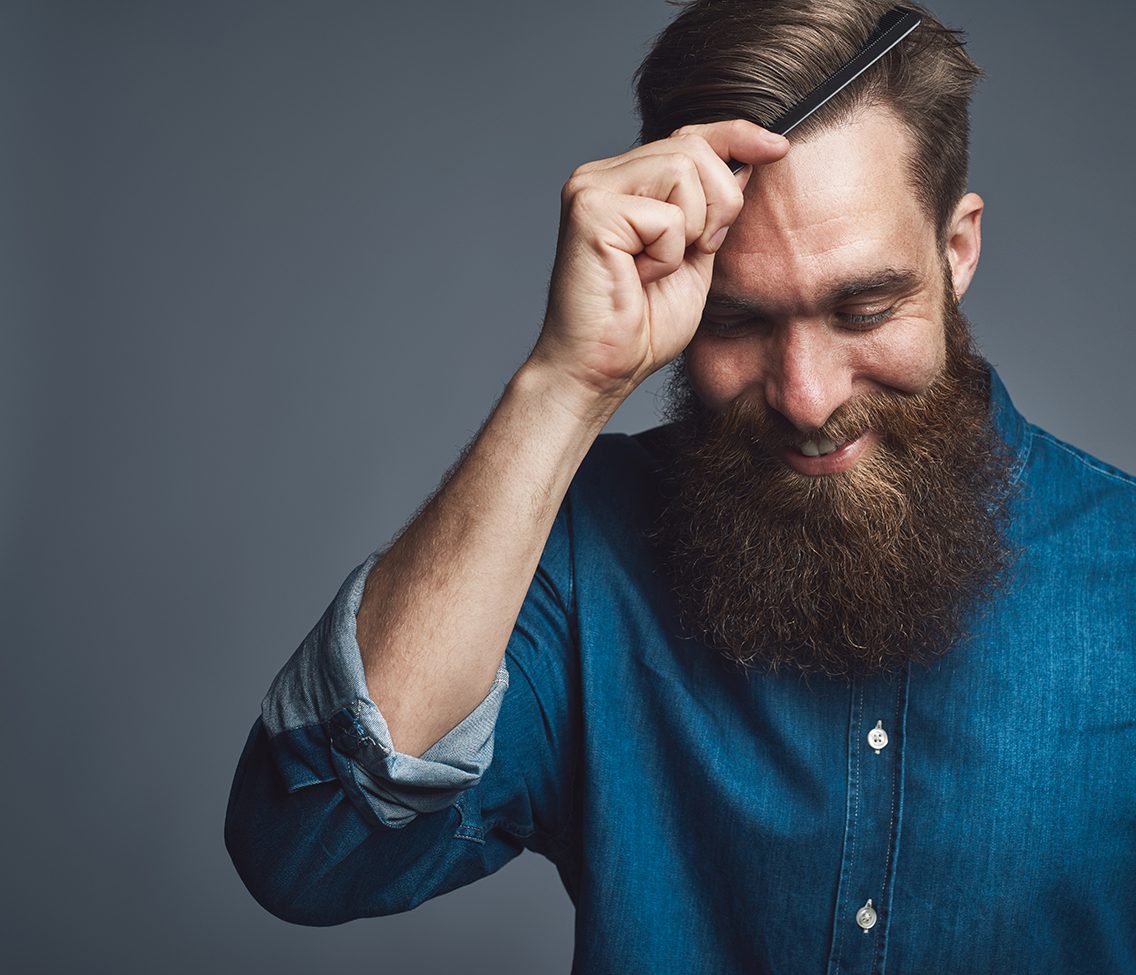 Rejuvenation Spa Men's Hair Care and Scalp Care Blog Post Image of Man combing his own hair