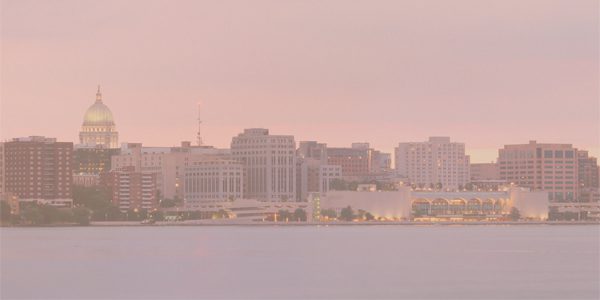 Hazy view of Madison, WI skyline under wildfire smoke and poor air quality