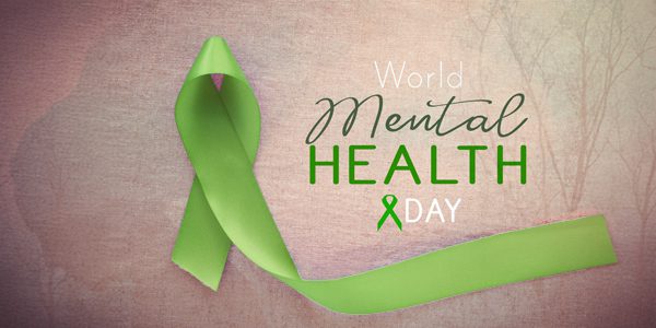 Rejuvenation Spa graphic with person and nature in background and green mental health day ribbon in foreground.